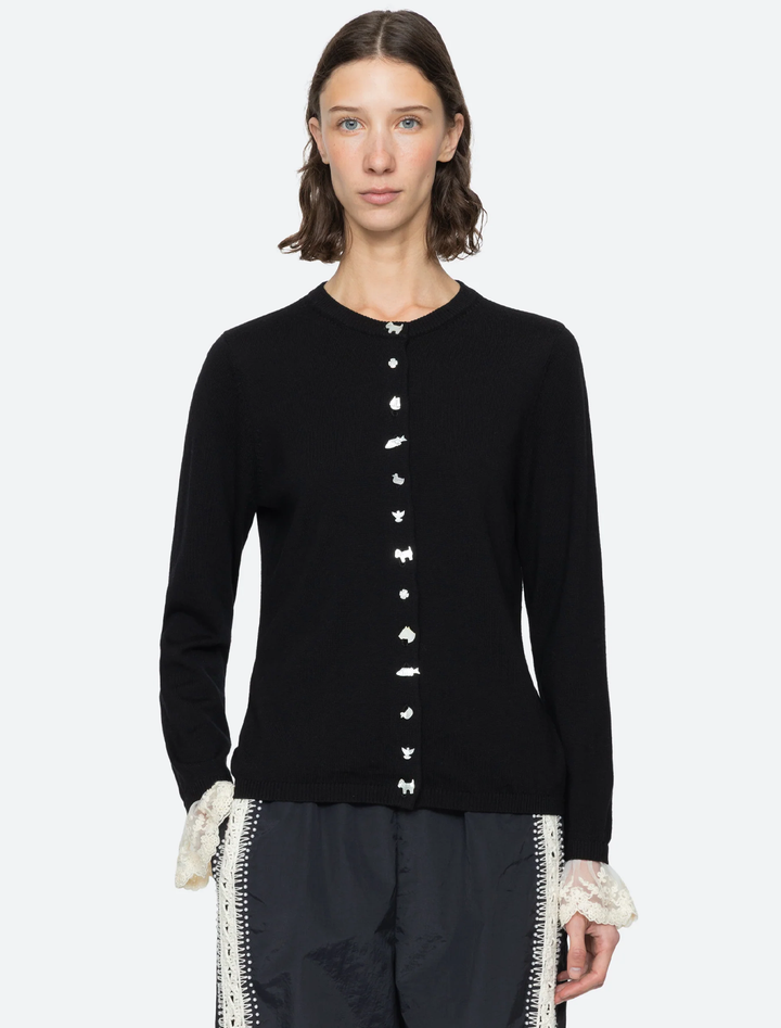 model wearing diane knit cardigan in black