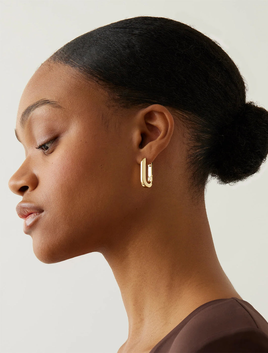 u-link earrings in gold