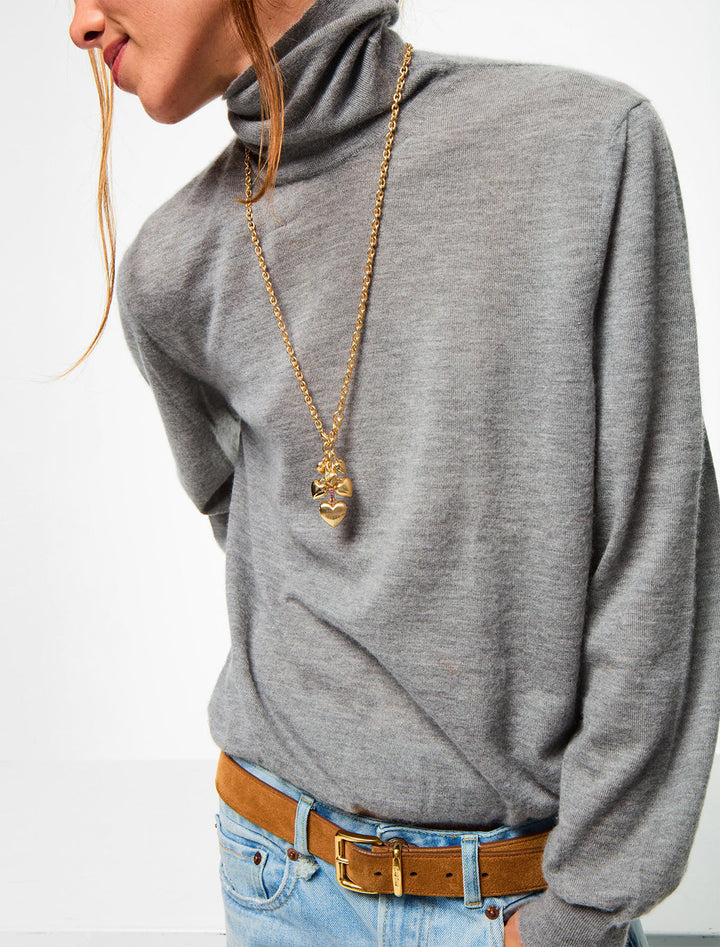 model wearing the family of hearts pendant