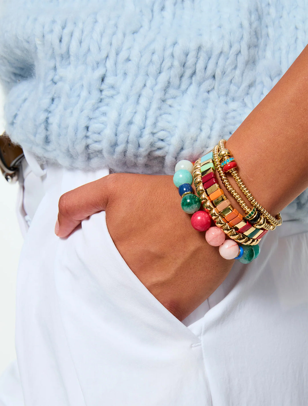 model wearing the slider bracelet duo in gold