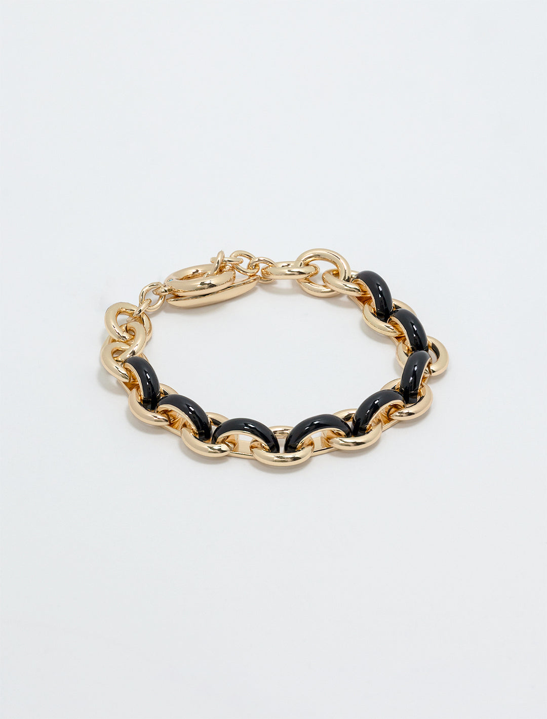 the classic link bracelet in gold and black