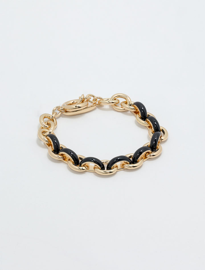 the classic link bracelet in gold and black