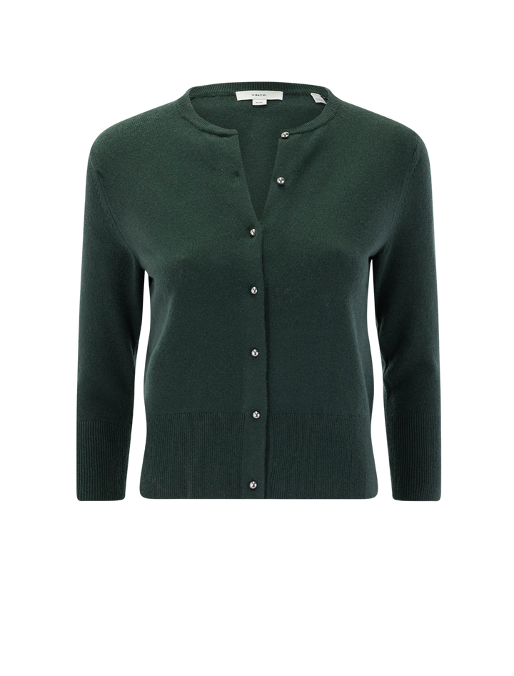 metal button cardigan in forest