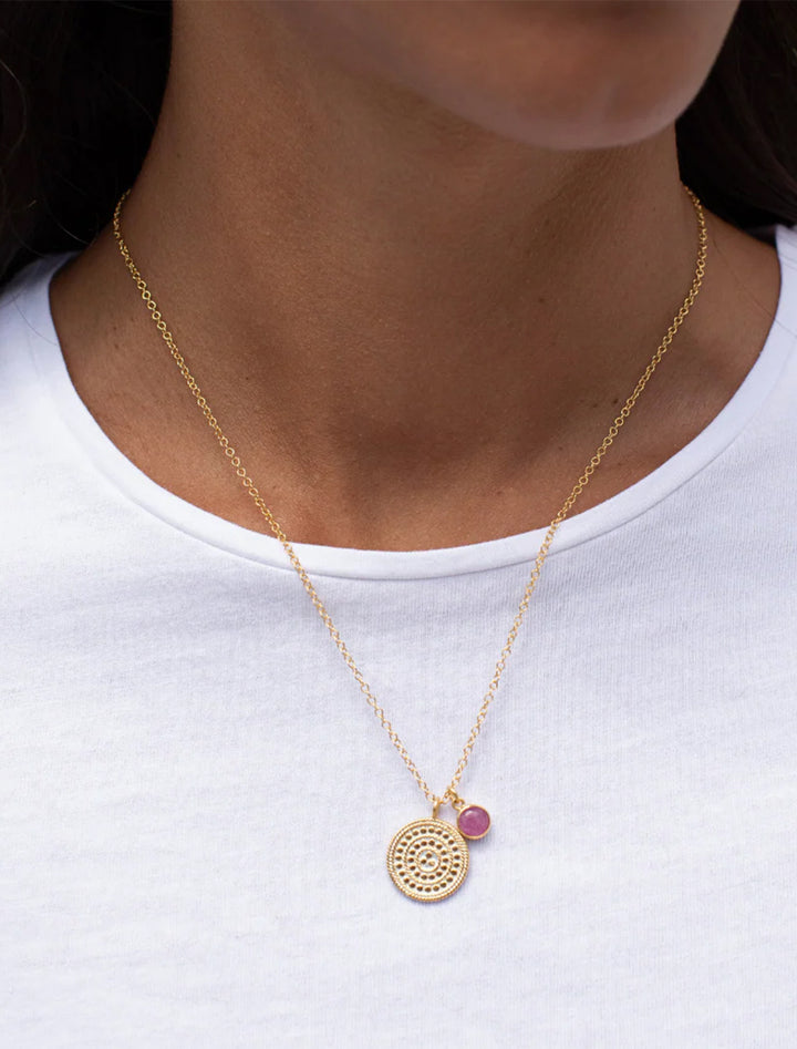 circle of life pendant necklace with pink ruby