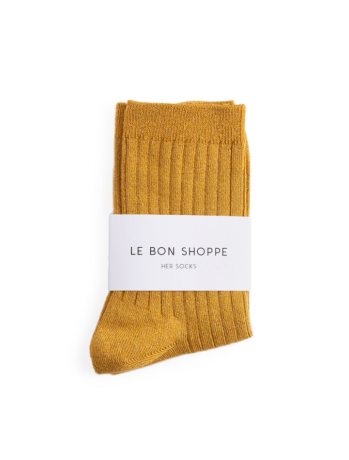 her socks in mustard glitter