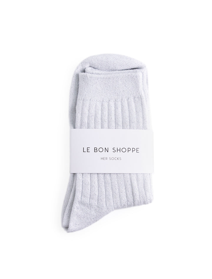 her socks in snow glitter