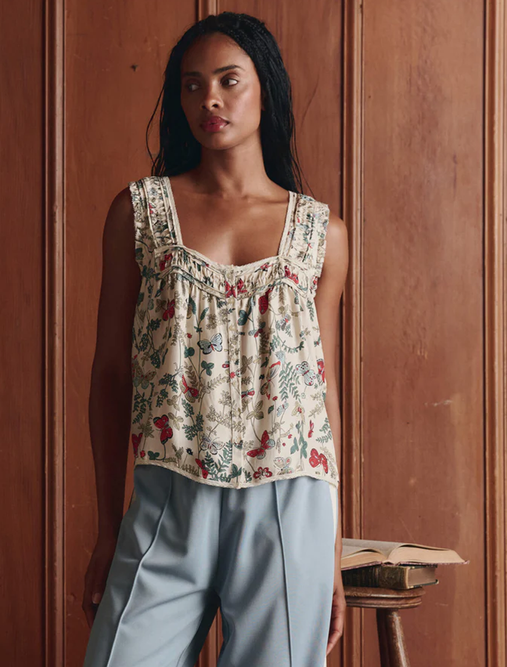 model wearing the victorian pleat tank in floating butterfly print