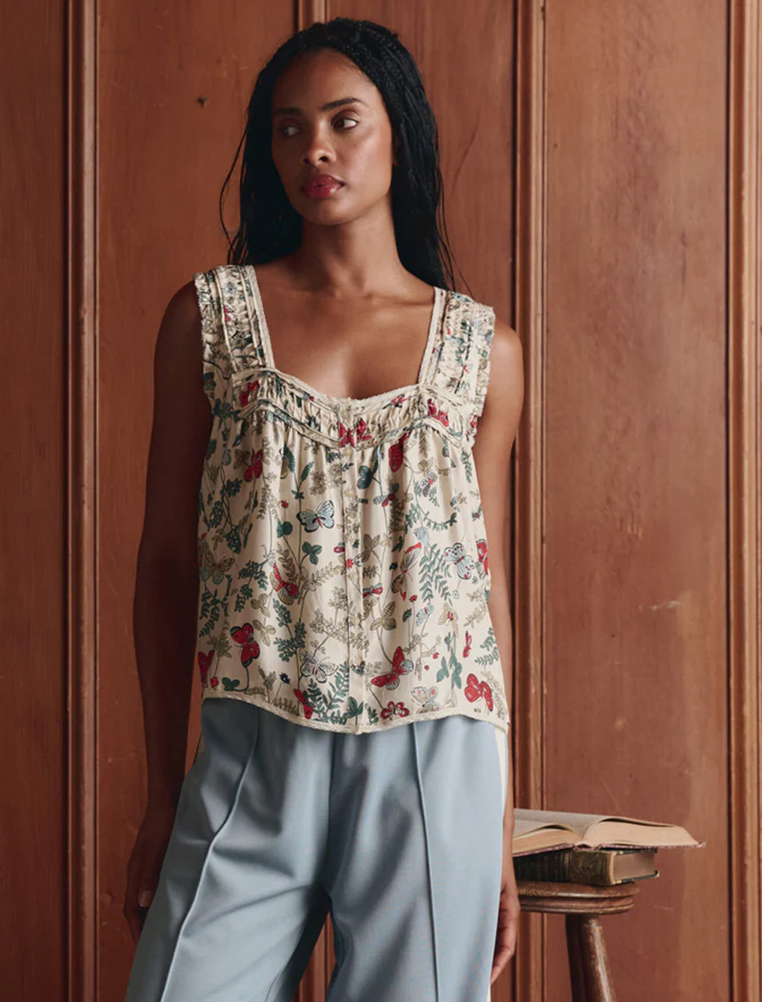 model wearing the victorian pleat tank in floating butterfly print