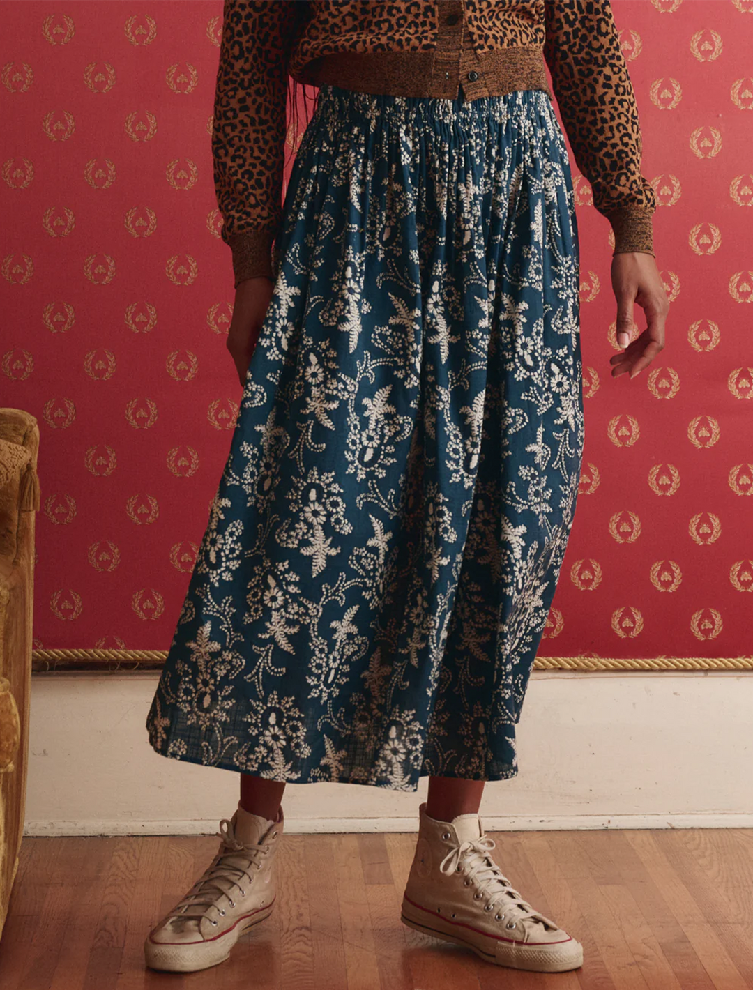 Model wearing The Great's the viola skirt in indigo bandana print.