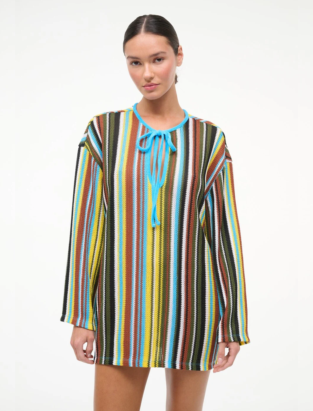 Model wearing Staud's catalina tunic dress in skate stripe.