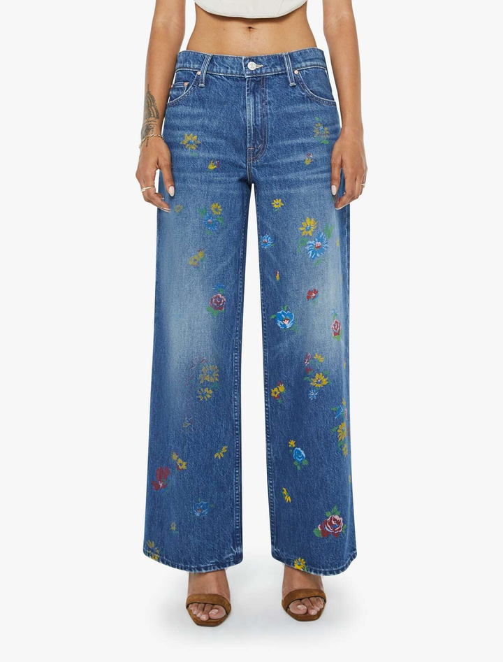 lil rerun zip sneak in field of flowers