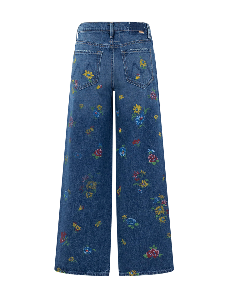 lil rerun zip sneak in field of flowers