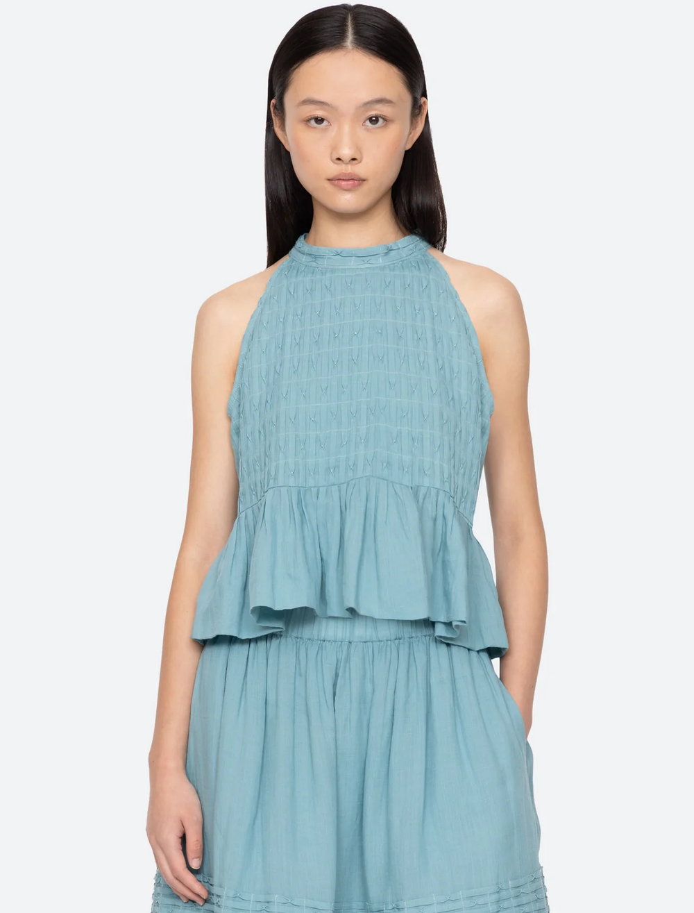 model wearing violet ramie tank in blue