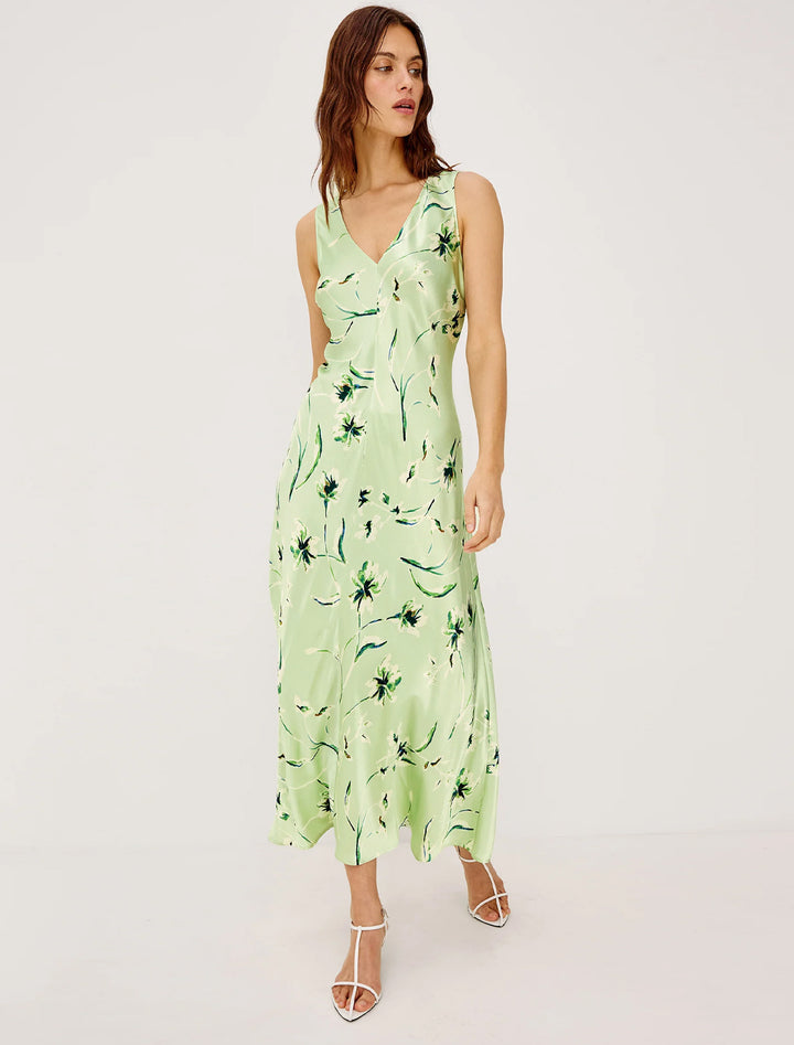 model wearing camellia dress in mint linnea