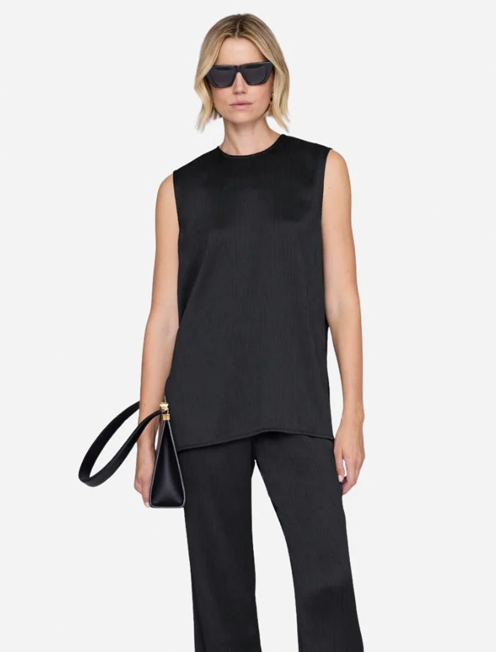 Model wearing Anine Bing's malia top in black.