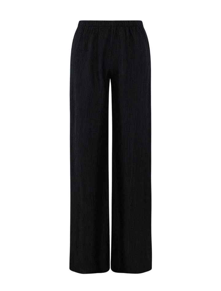 Front view of Anine Bing's aden plisse pant in black.