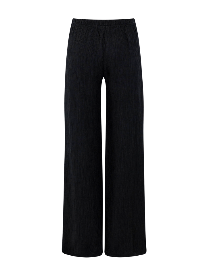 Back view of Anine Bing's aden plisse pant in black.