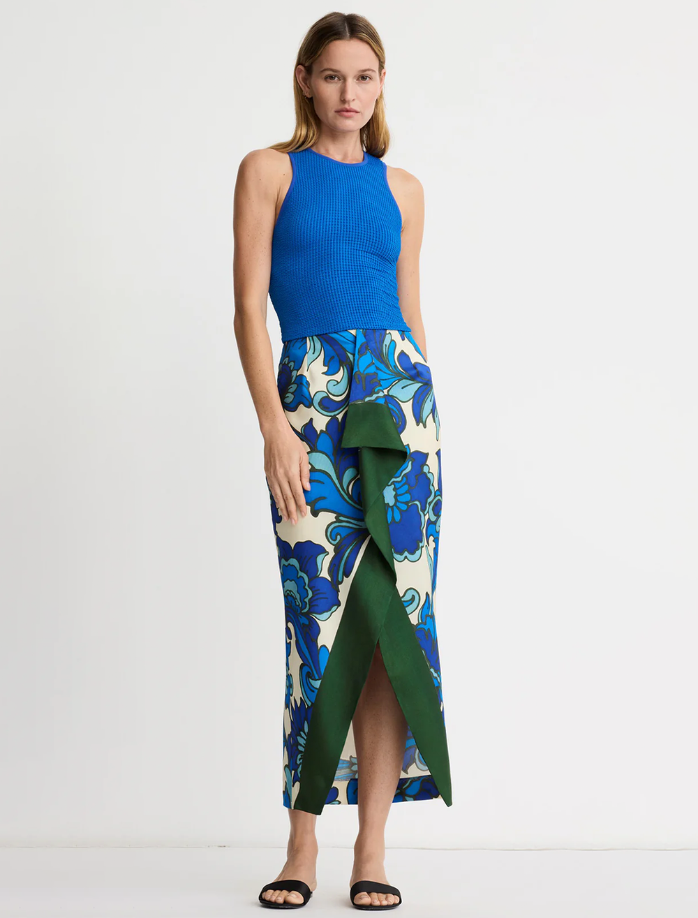 Model wearing Smythe's front ruffle skirt in aegean multi print.