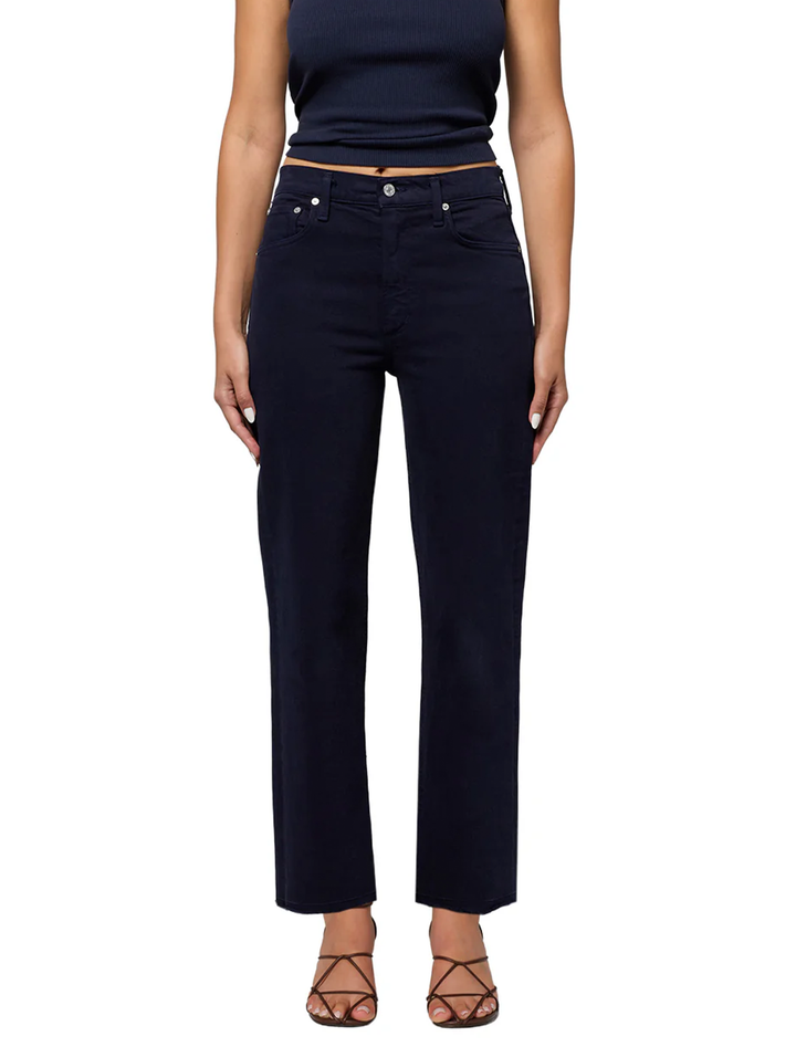 Model wearing Citizens of Humanity's palma straight jeans in navy.