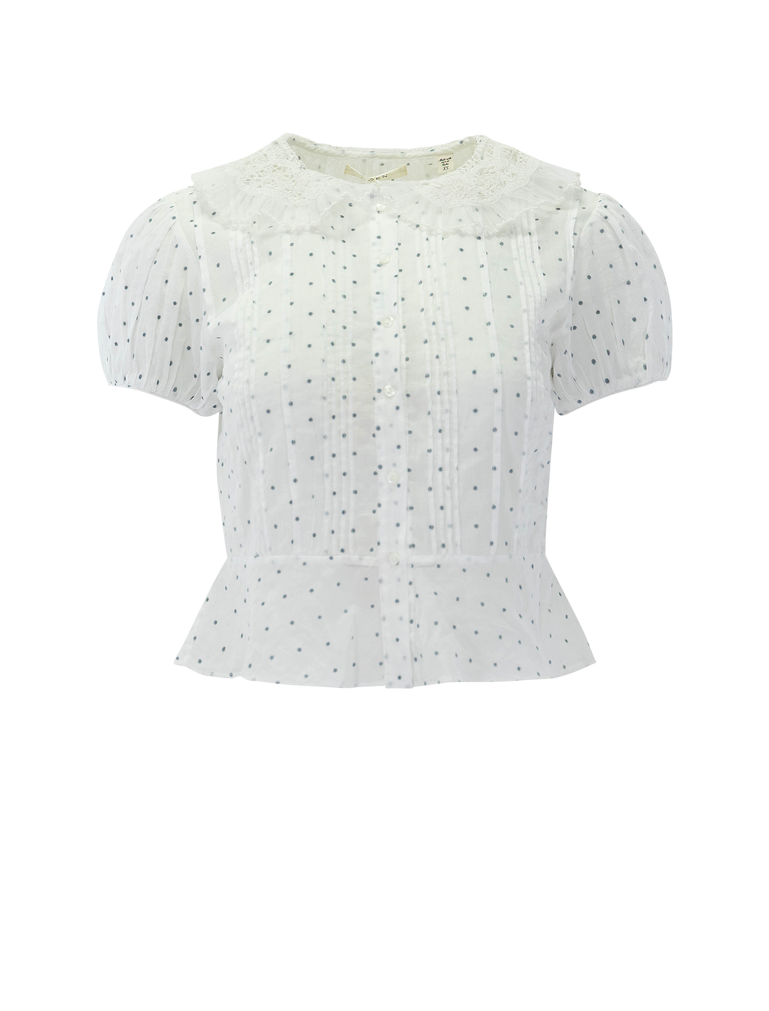 front view of oleta top in flock polkadot