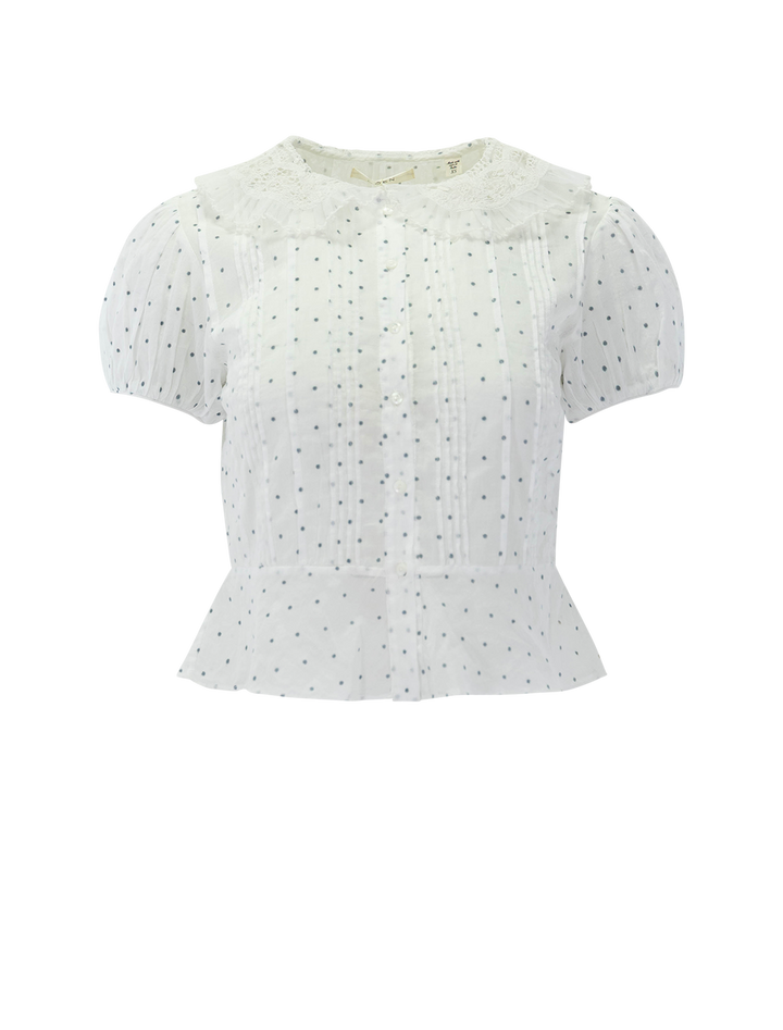 front view of oleta top in flock polkadot