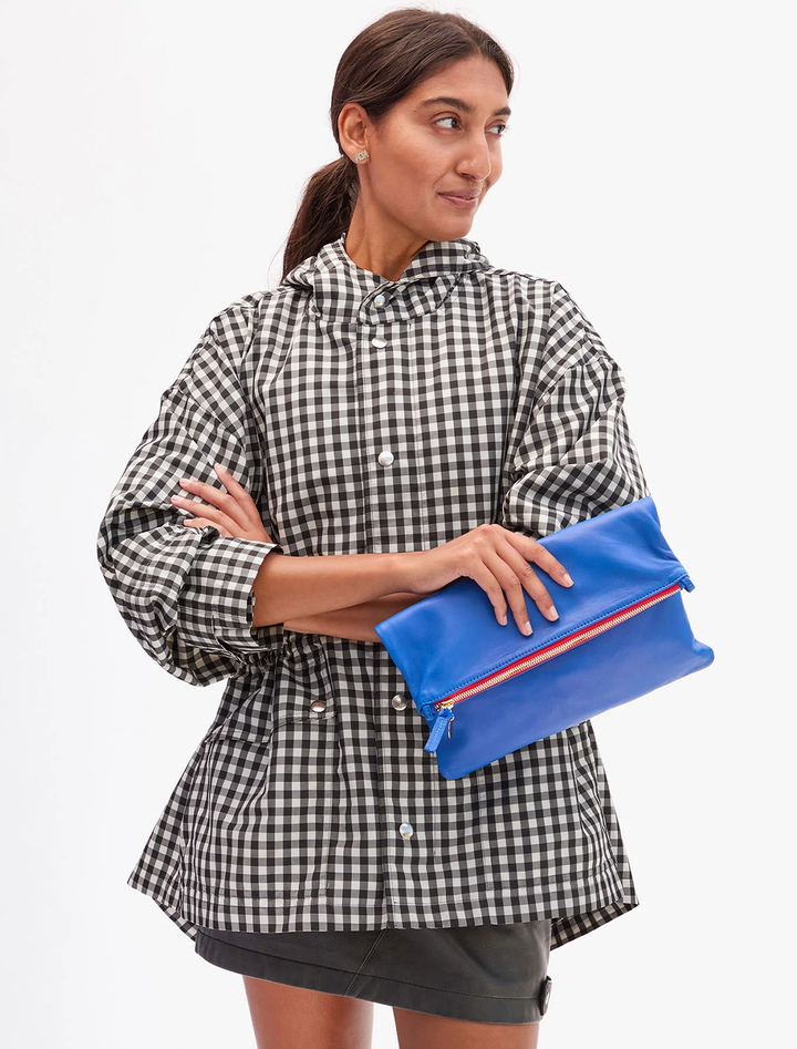 foldover clutch with tabs in electric blue