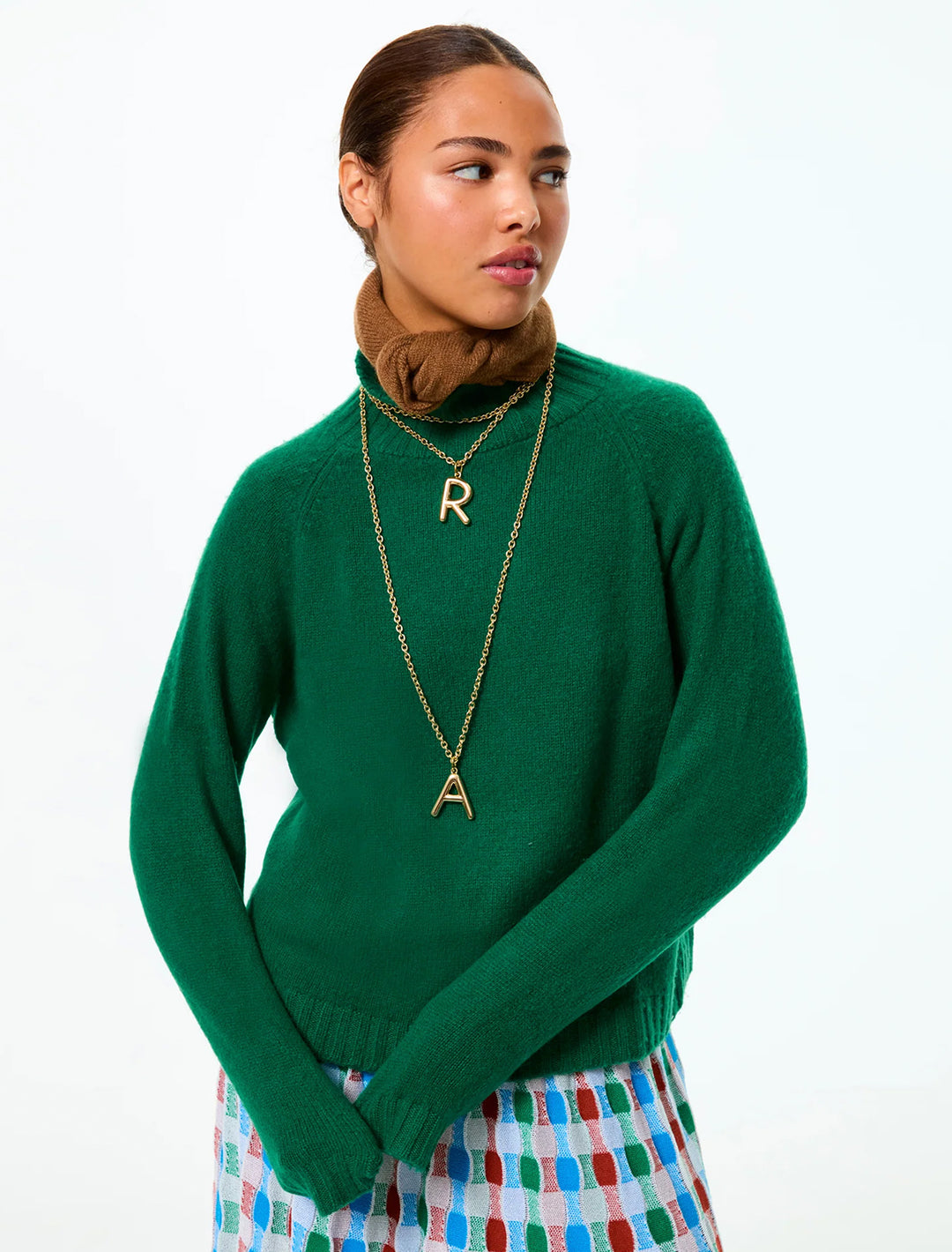 model wearing the big puffy initial necklace | R