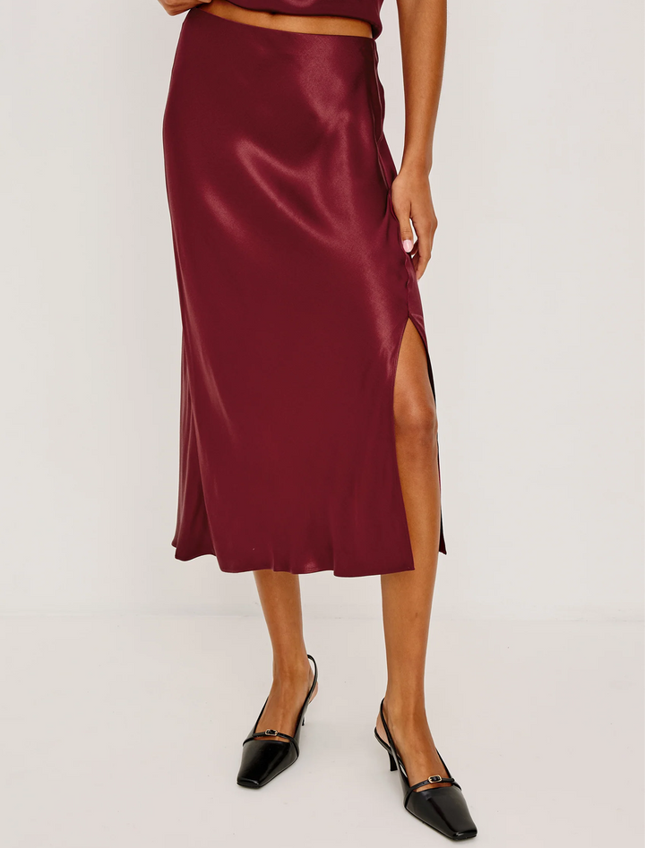 model wearing maya skirt in garnet