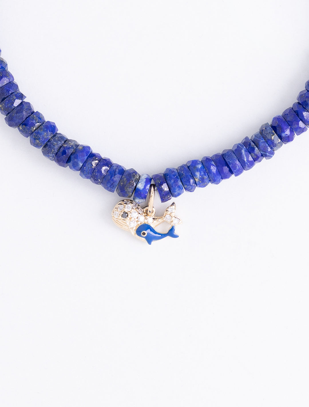 gold and diamond whale family on lapis beaded bracelet