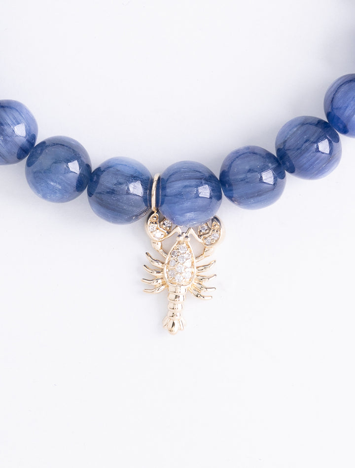 gold and diamond lobster on kyanite beaded bracelet