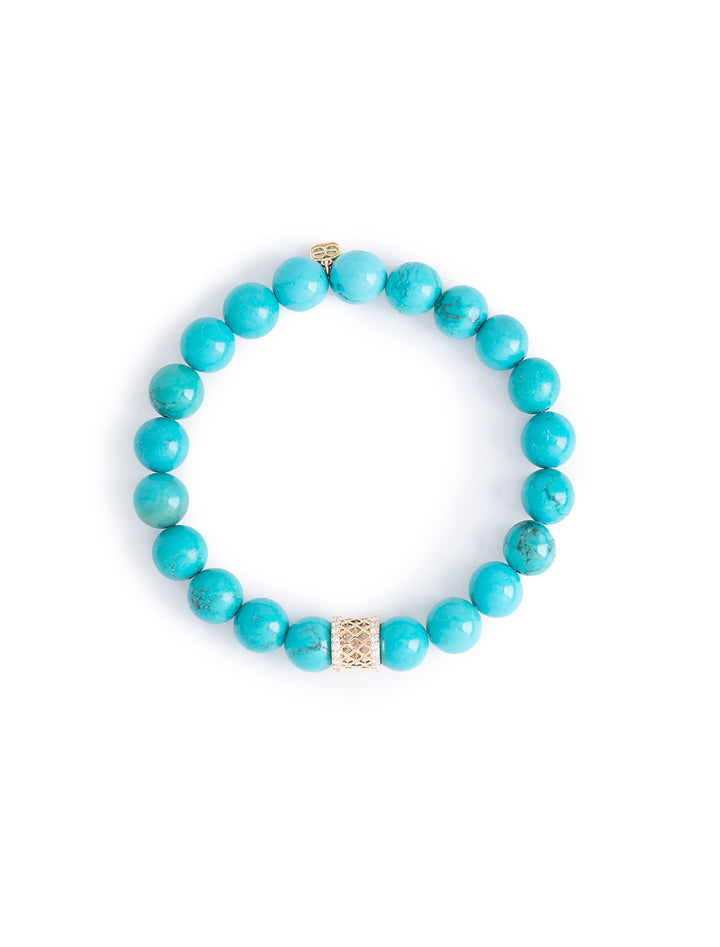 gold and diamond fishnet rondelle on turquoise beaded bracelet