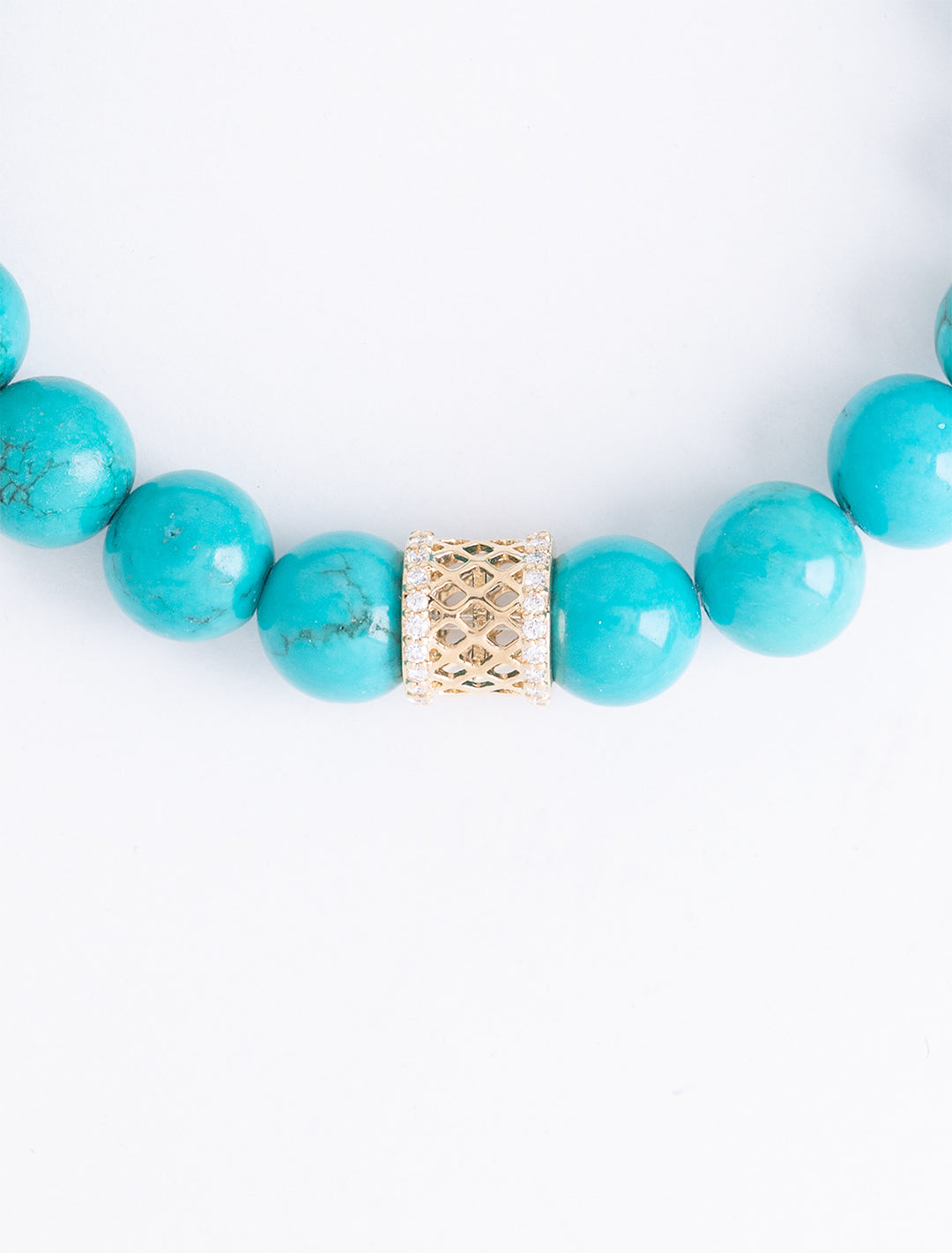 gold and diamond fishnet rondelle on turquoise beaded bracelet