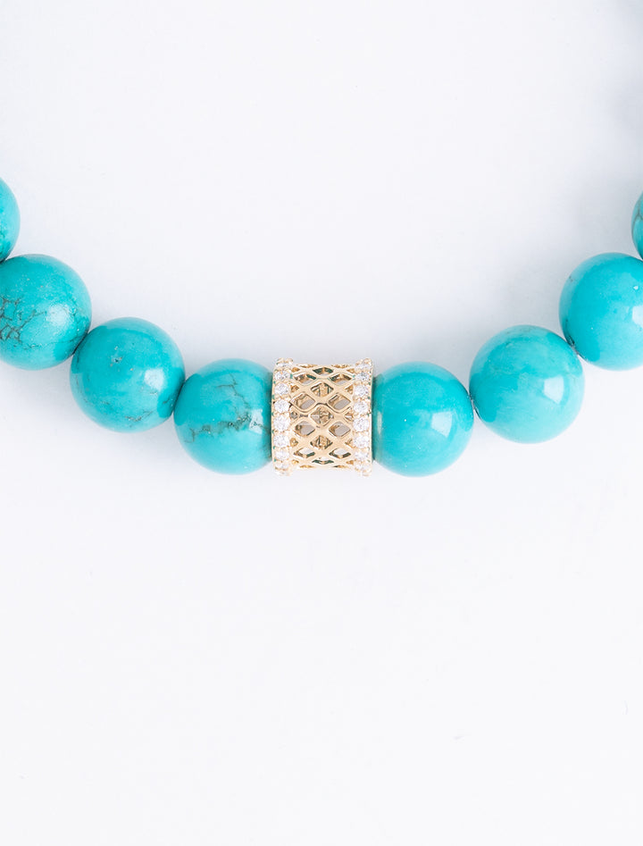 gold and diamond fishnet rondelle on turquoise beaded bracelet