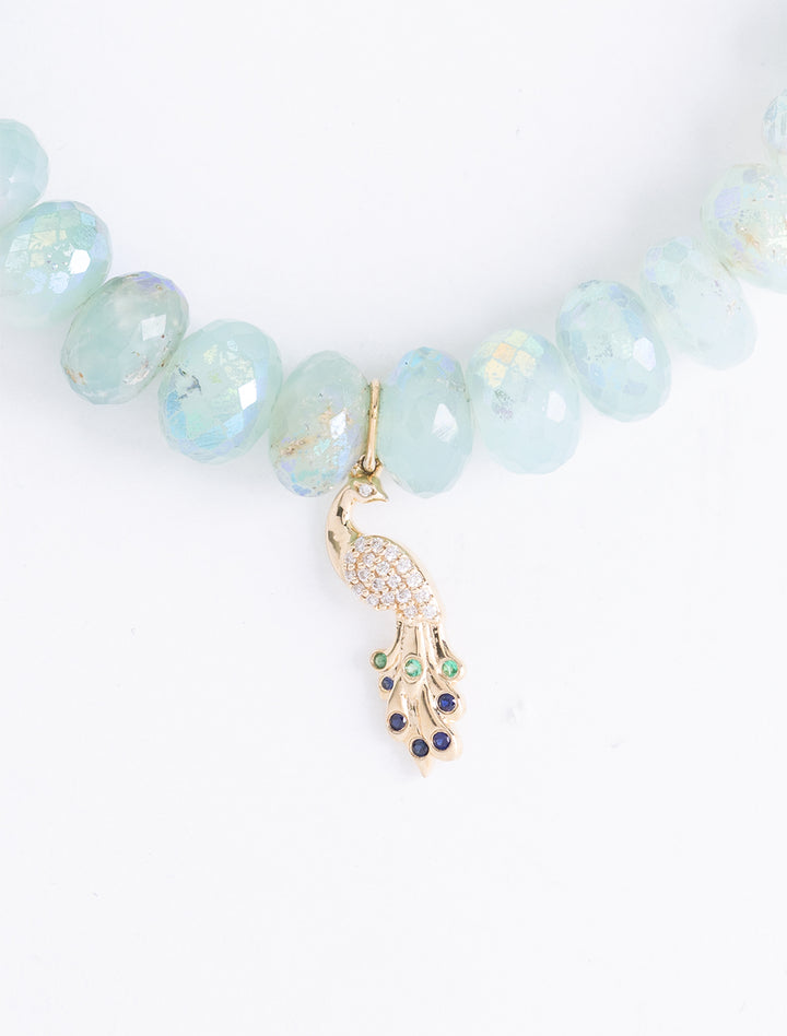 diamond and gold peacock on aquamarine beaded bracelet