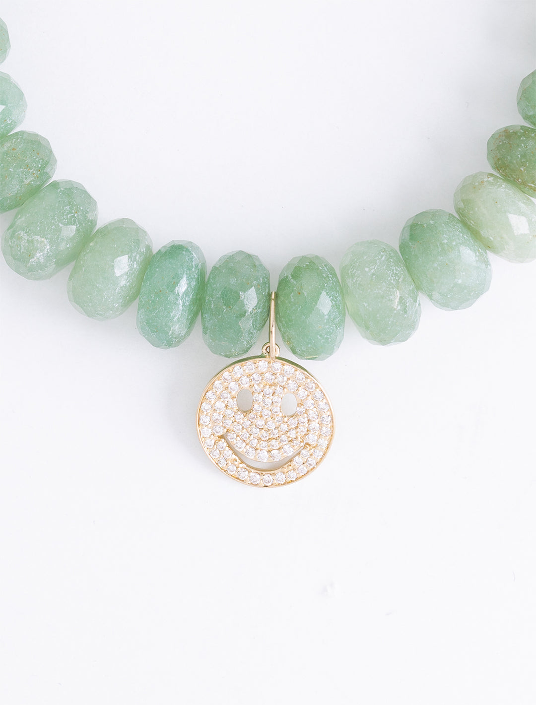 diamond and gold happy face on 10mm green silverite beaded bracelet