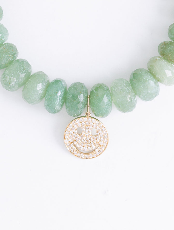 diamond and gold happy face on 10mm green silverite beaded bracelet