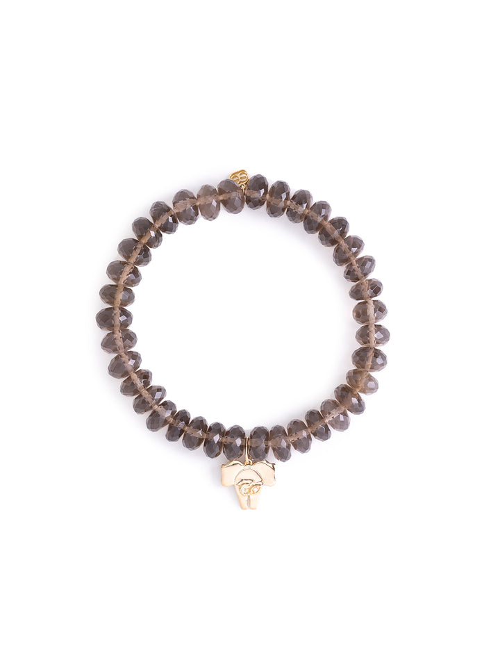 gold elephant tail charm on smokey quartz
