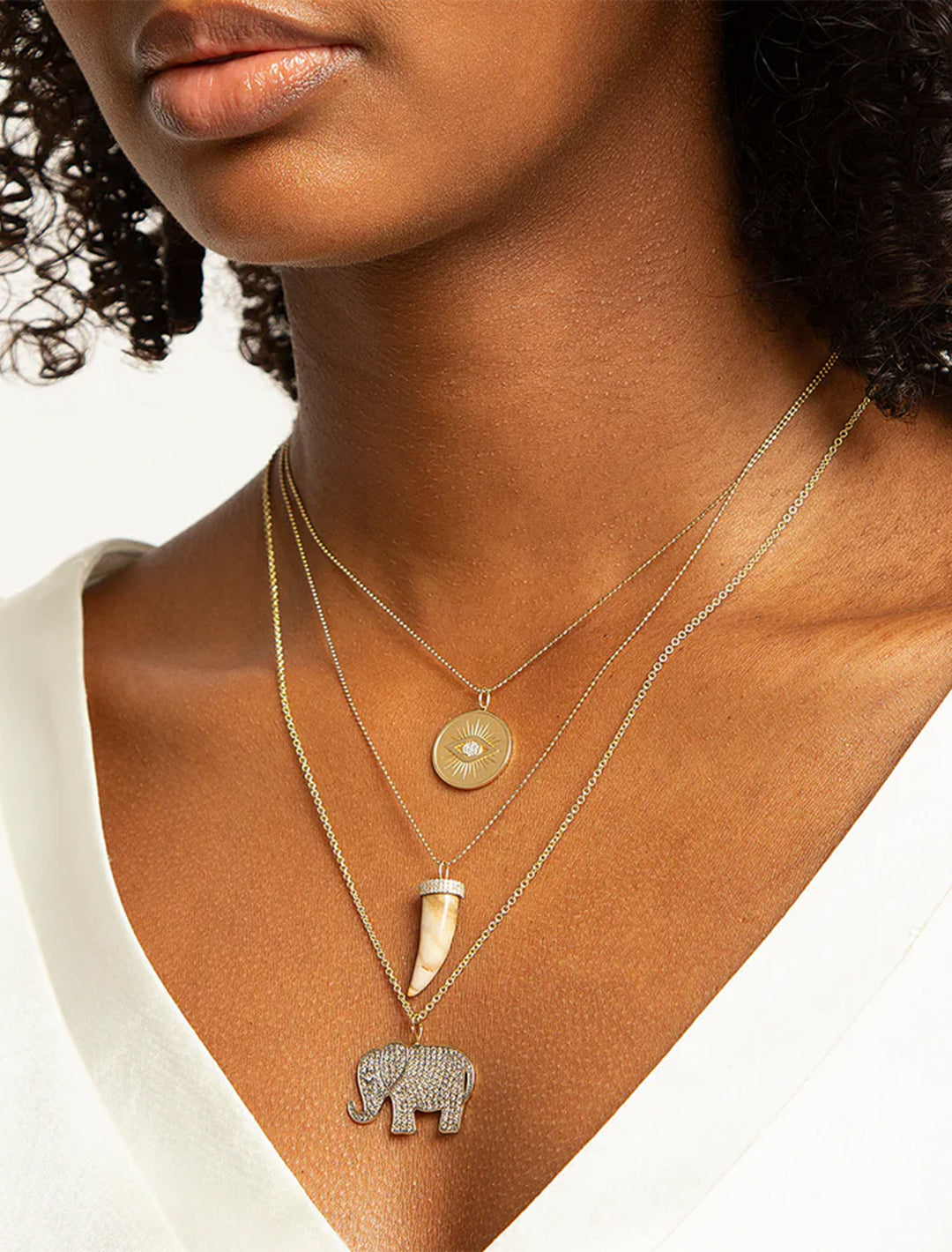 diamond and gold protective eye charm