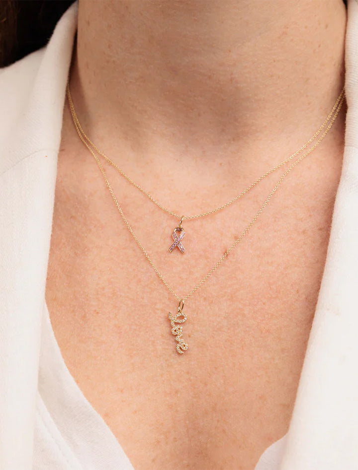 diamond and gold love script charm