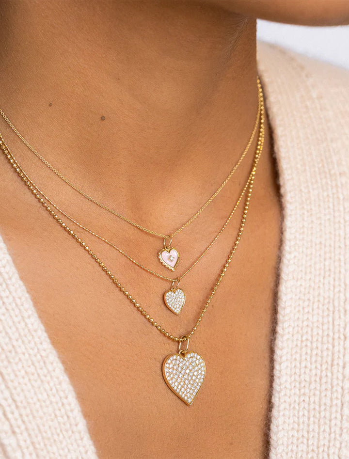pave diamond and gold heart charm
