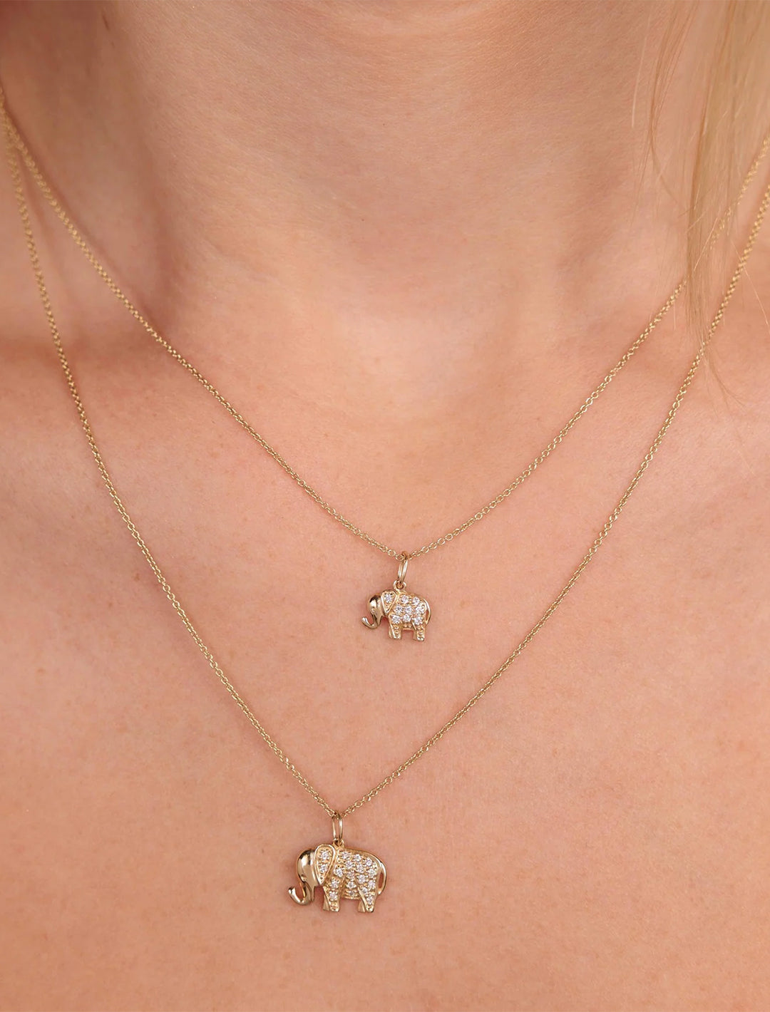 diamond and gold elephant charm