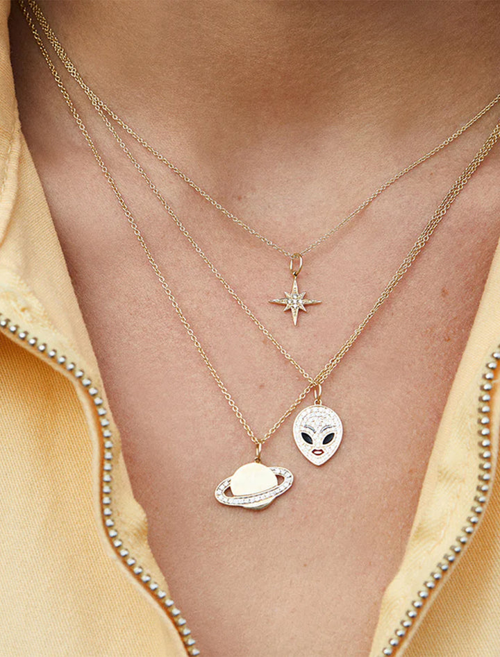 pave and gold startburst charm