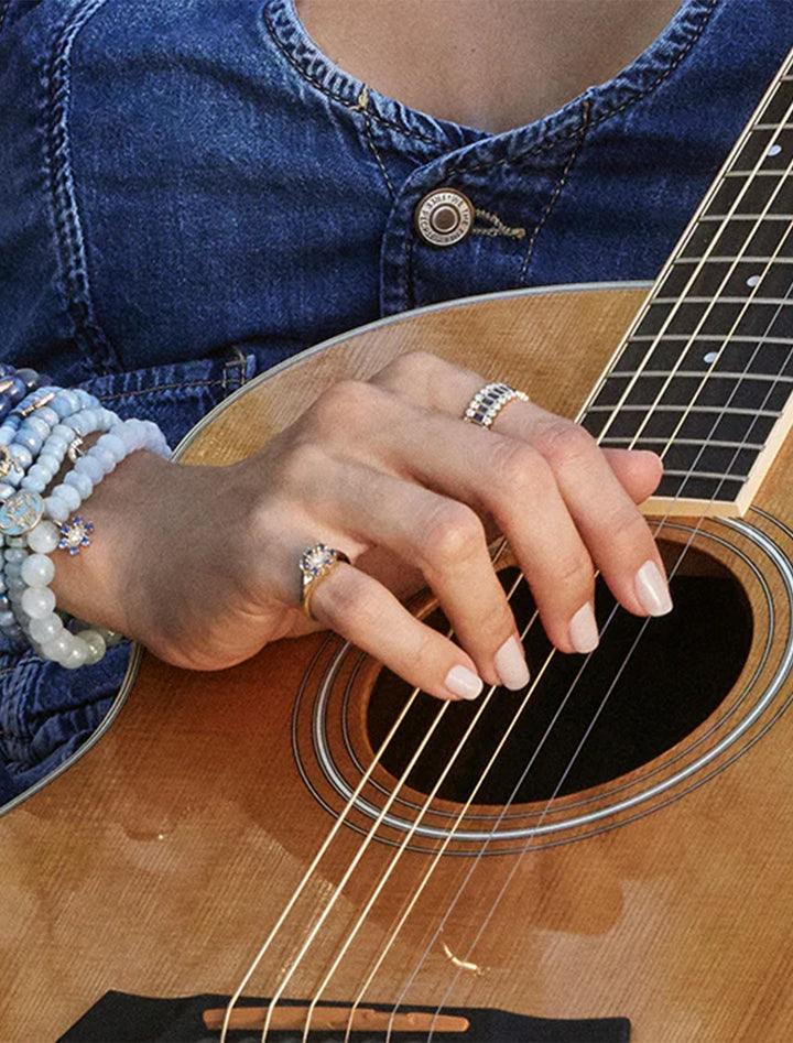 gold baguette and round bezel stacked eternity ring