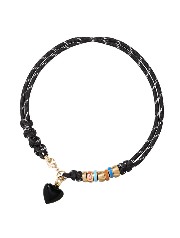 super size happy cord necklace in black with black hearts