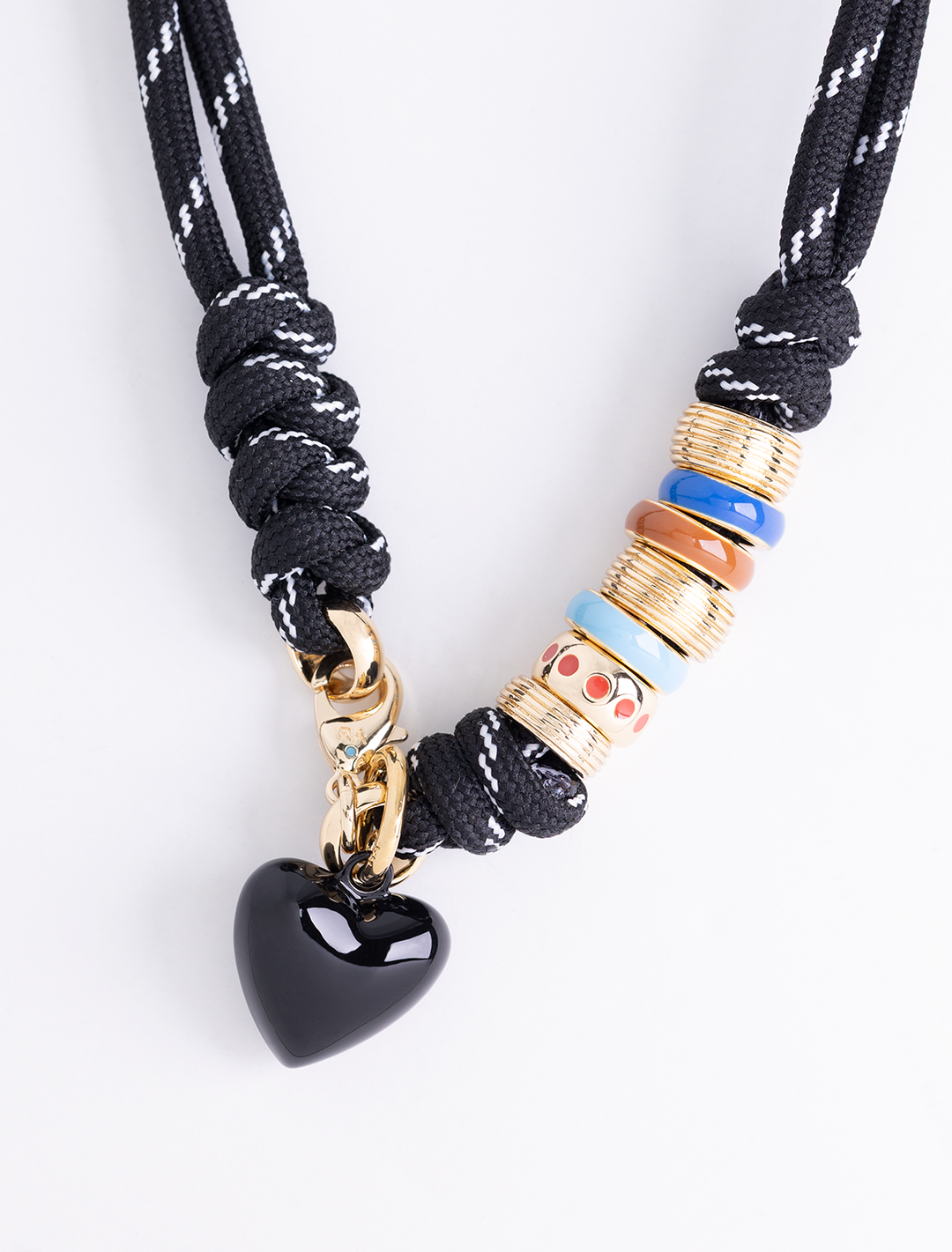 super size happy cord necklace in black with black hearts