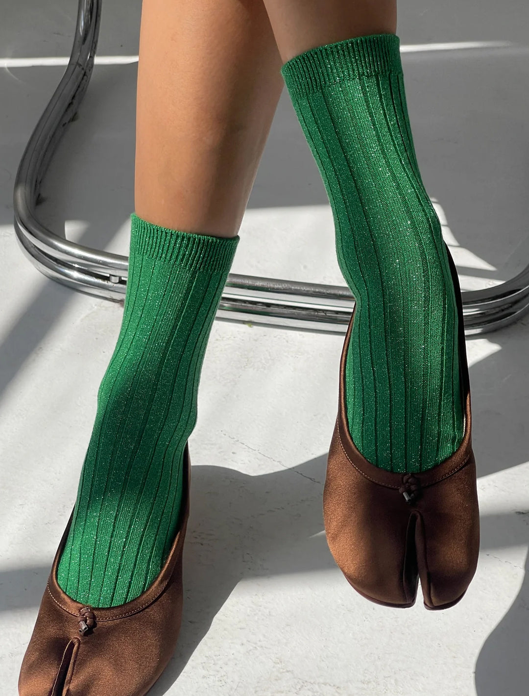 her socks in emerald glitter