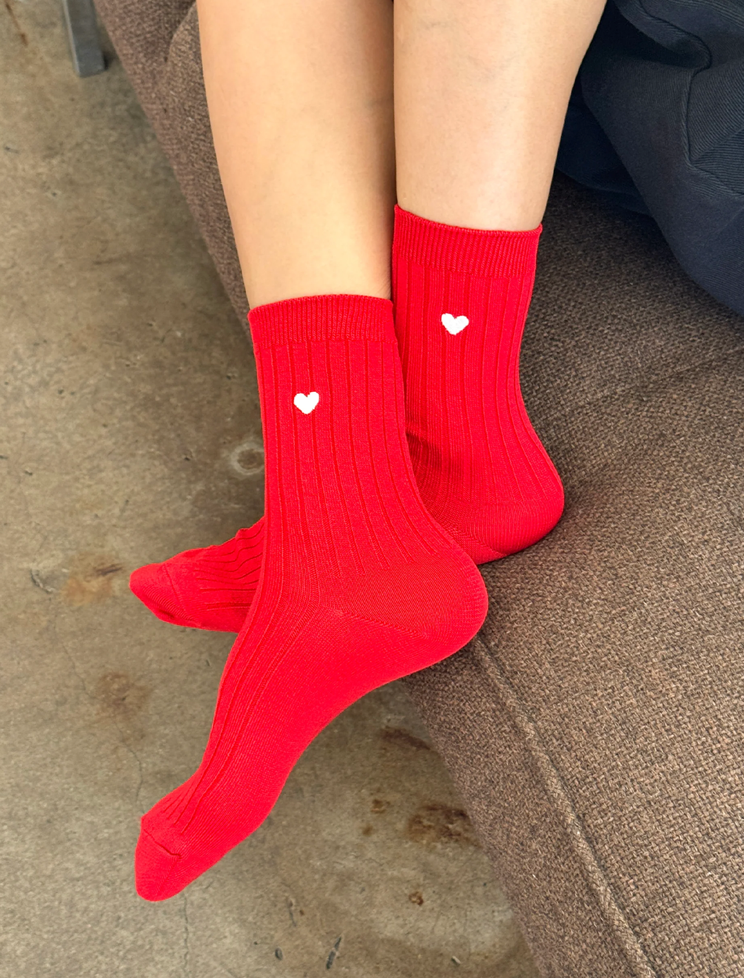 her socks in classic red with embroidered heart