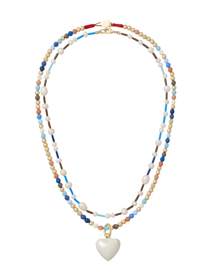 the happy baby bead necklace duo in creme