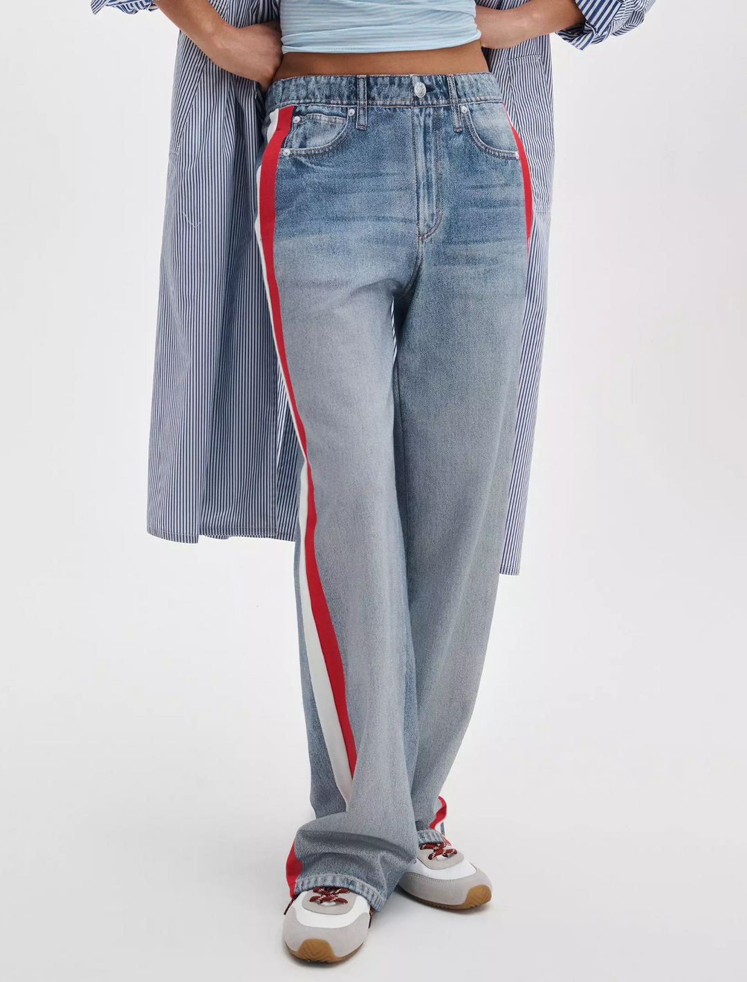 model wearing miramar terry track pant in red and white stripe