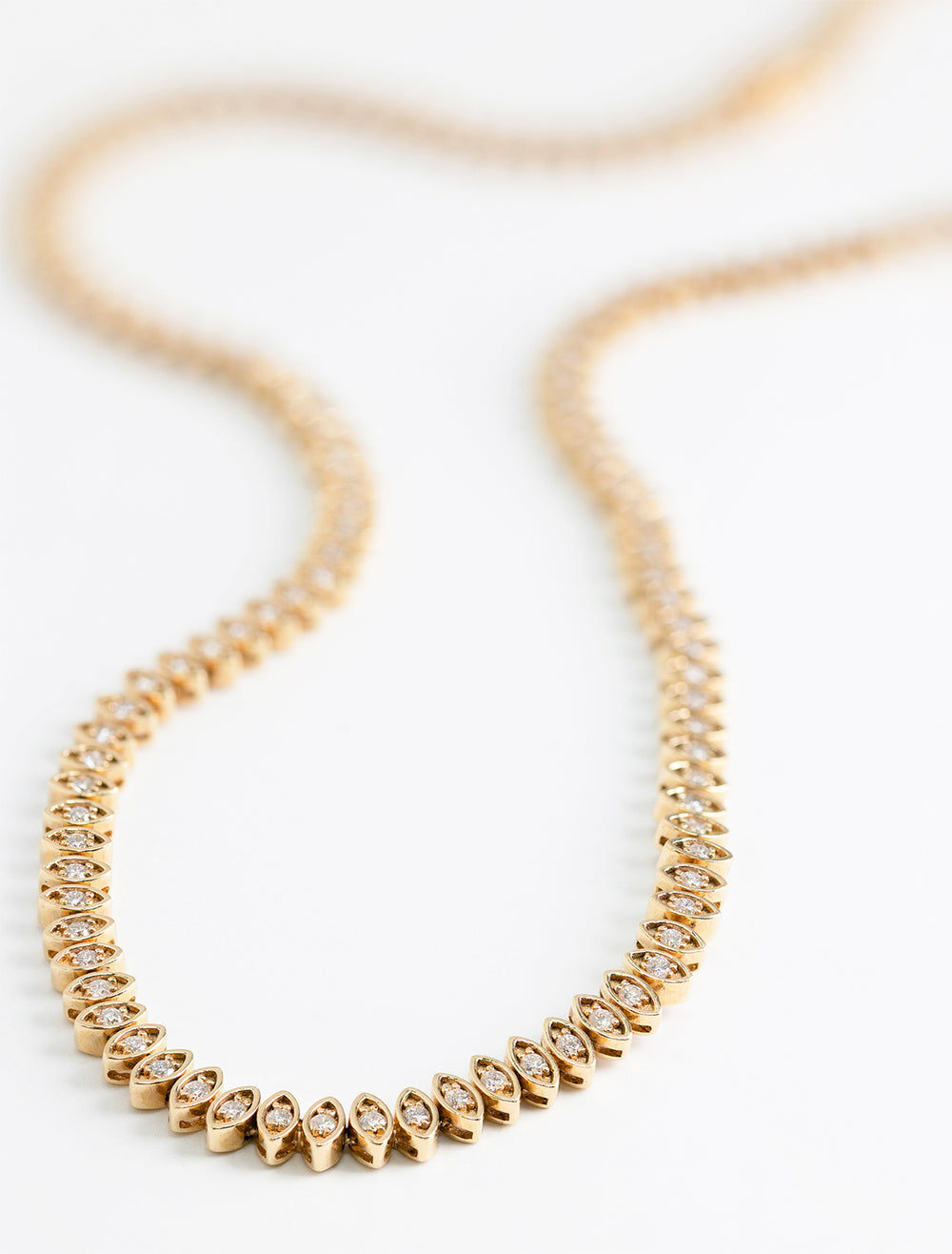 Close-up view of Sydney Evan's marquise eternity necklace.